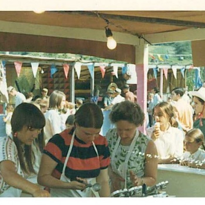 Volunteers at a fair booth